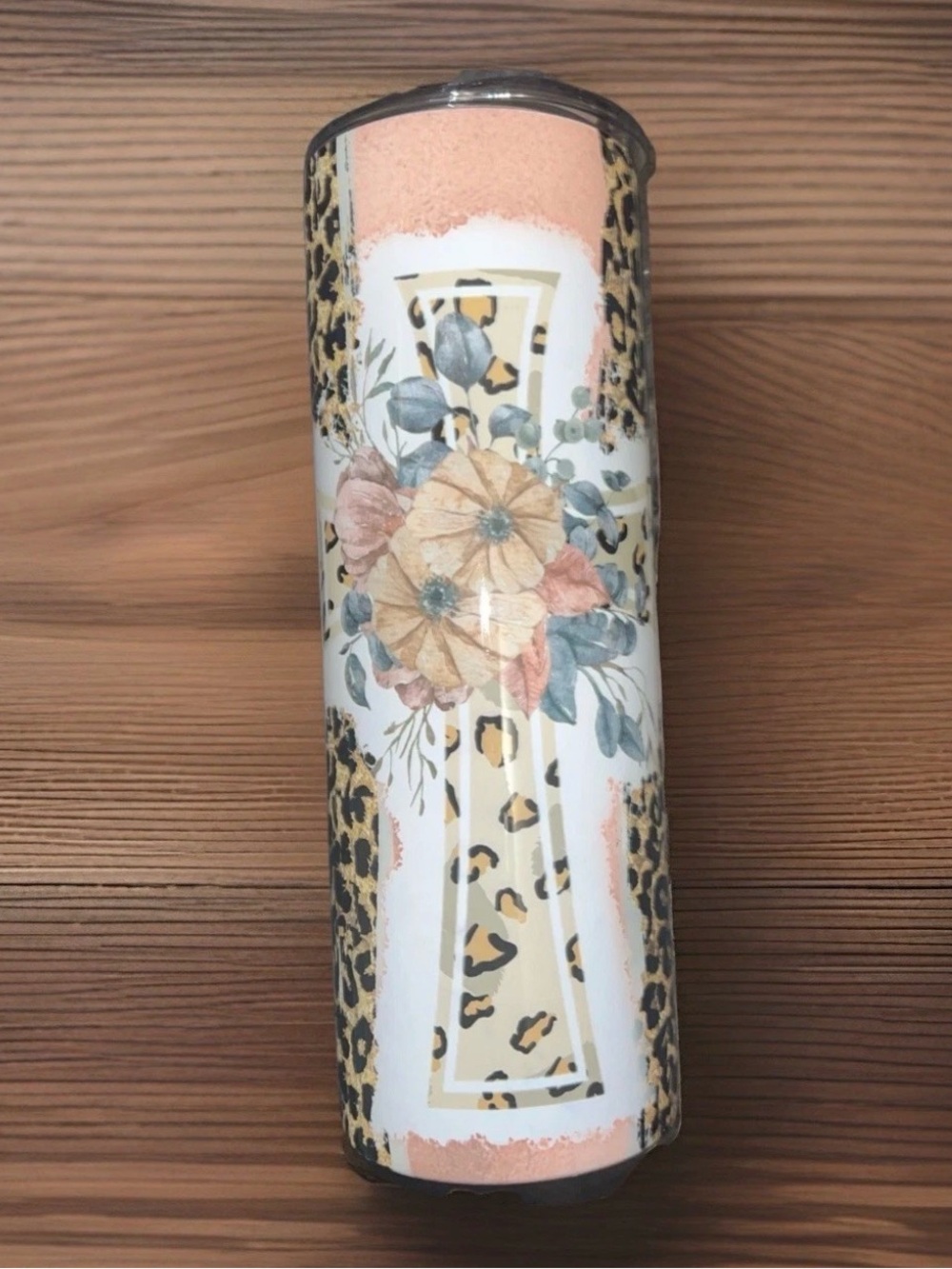 Peach colored tumbler with a leopard cross and flowers. Brand new! #539
